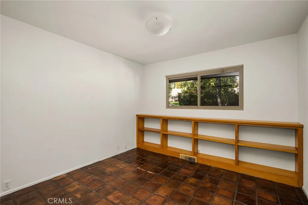 Another includes pavers and built-in bookcase