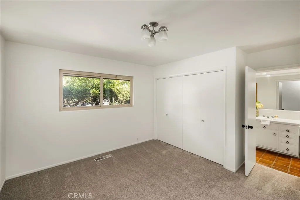 One of three addtional bedrooms with own bath