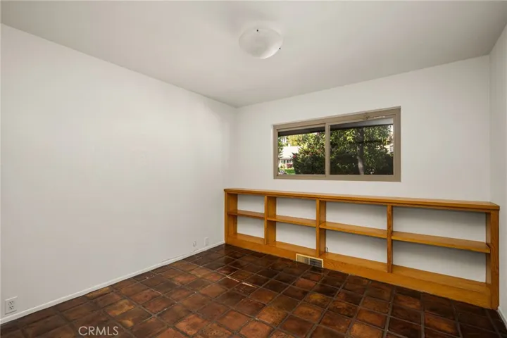 Another includes pavers and built-in bookcase