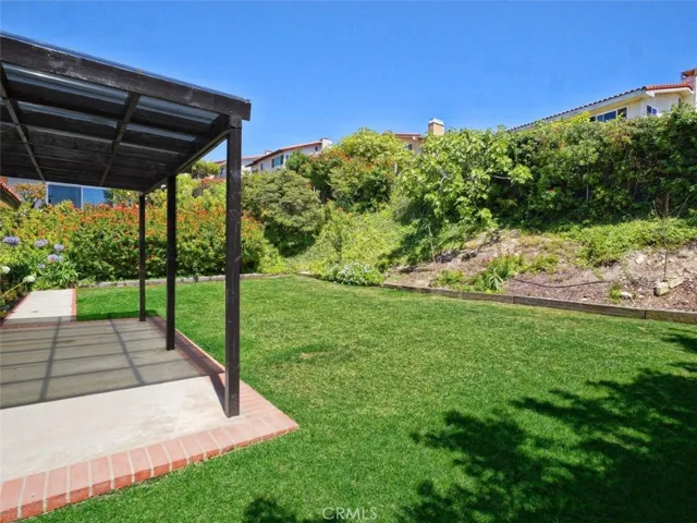Grassy Backyard with Patio