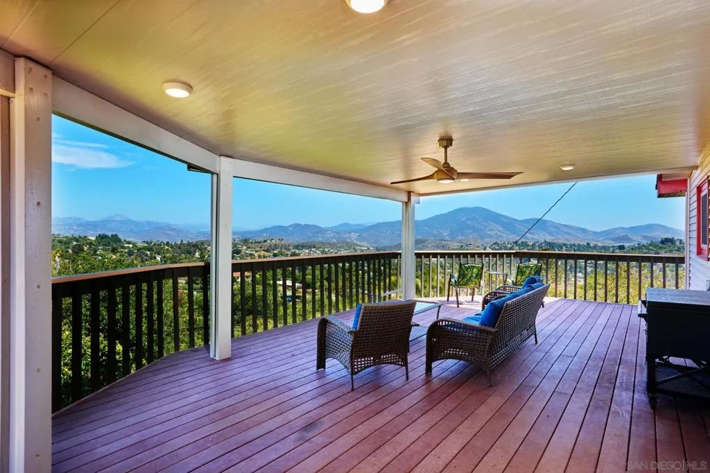Upstairs, wraparound deck connecting living, dining, master bedroom.