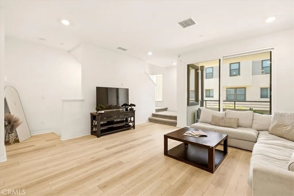 Spacious living room with plenty of natural light