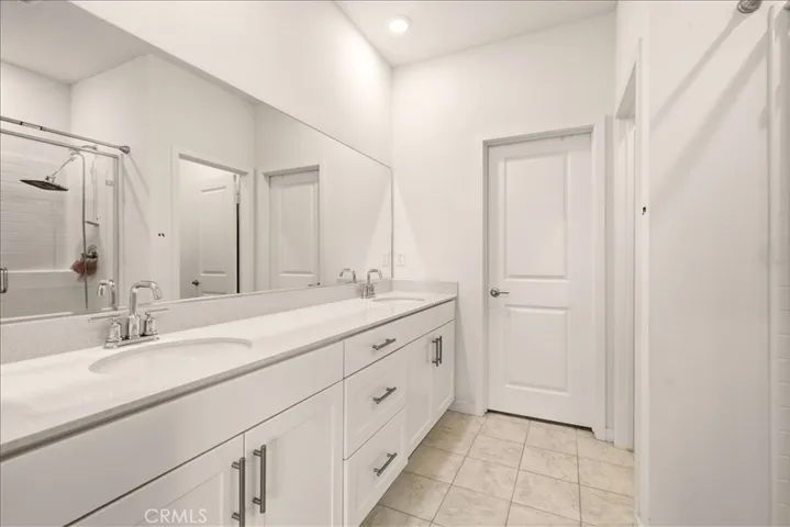 Spacious Master bathroom with double sink and walk-in closet