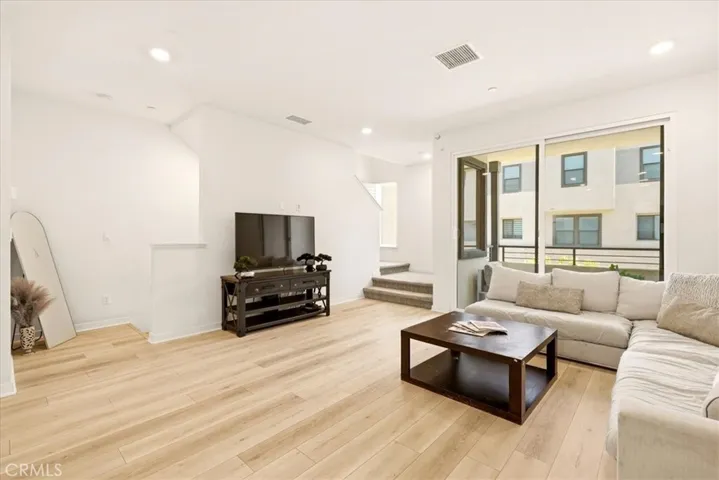 Spacious living room with plenty of natural light