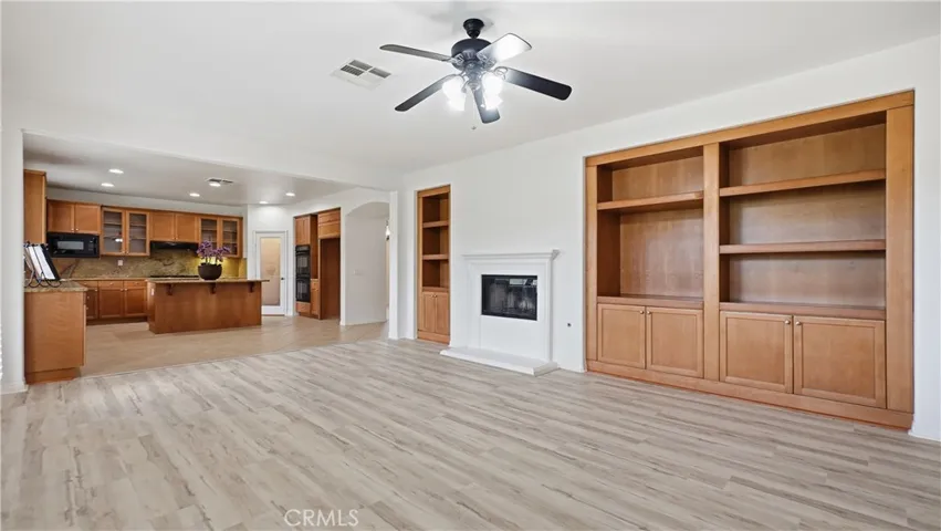 Family room has fireplace and built in cabinets