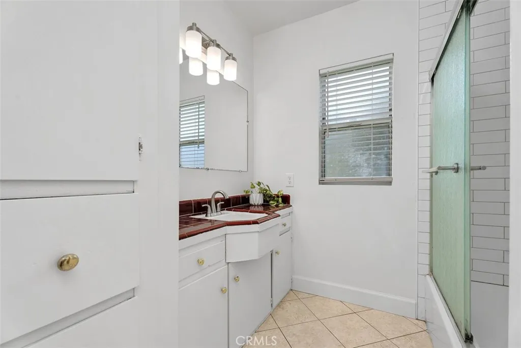 Full bathroom in hallway.