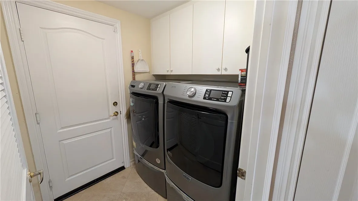 Separate Laundry room with Storage