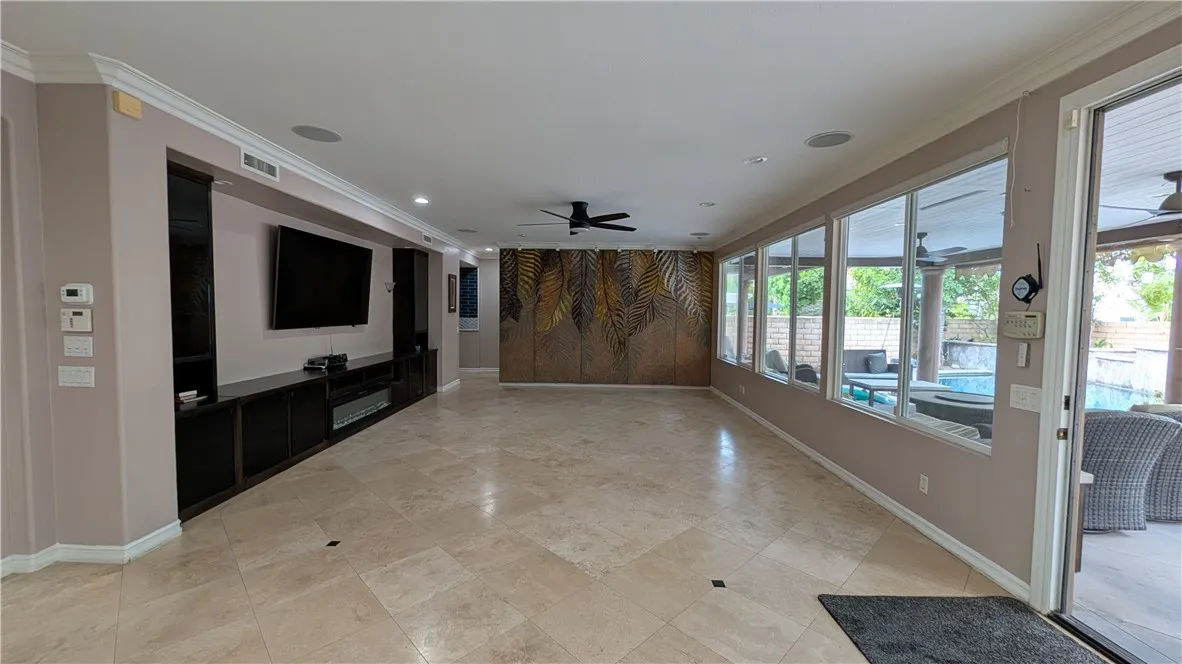 Family room with built-in Custom Entertainment Center view 2
