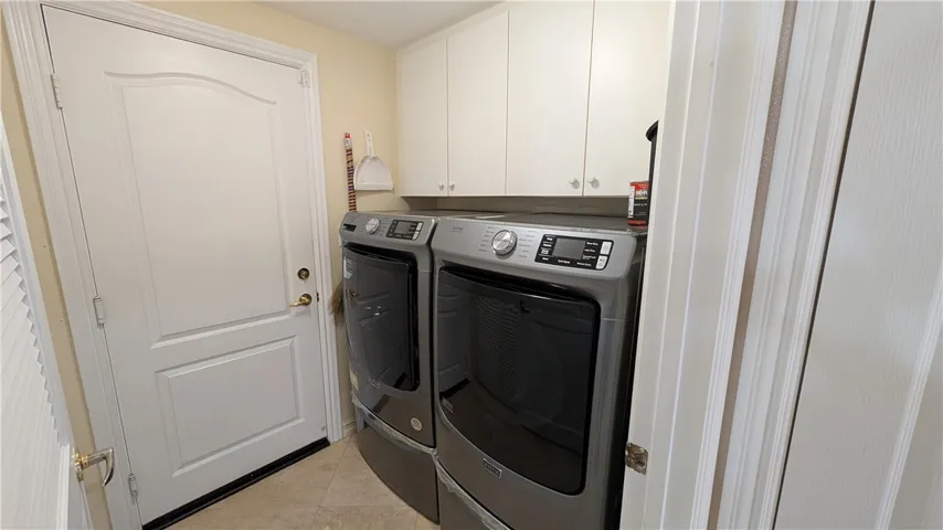 Separate Laundry room with Storage