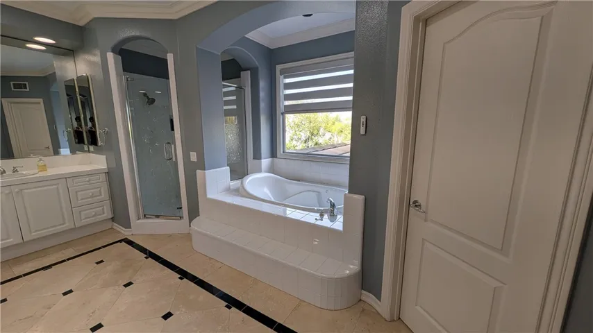 Soaking tub with jets in primary bath