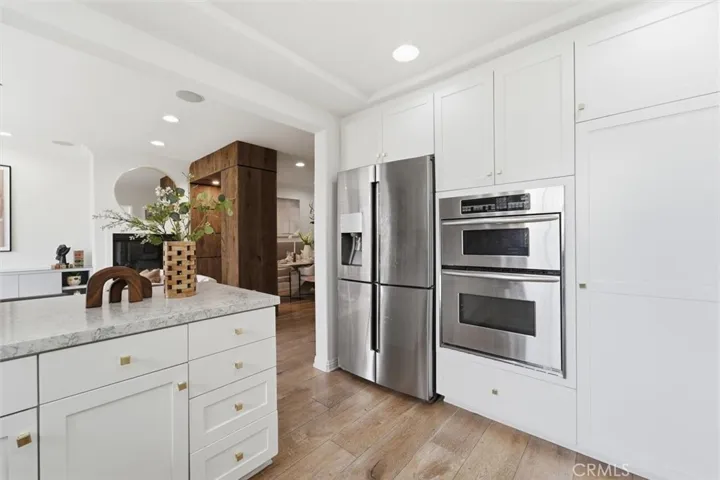 Kitchen opens to living