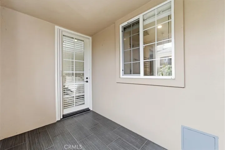 Primary bedroom has private balcony
