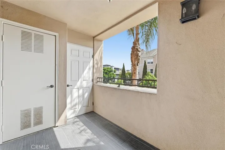Primary bedroom has private balcony