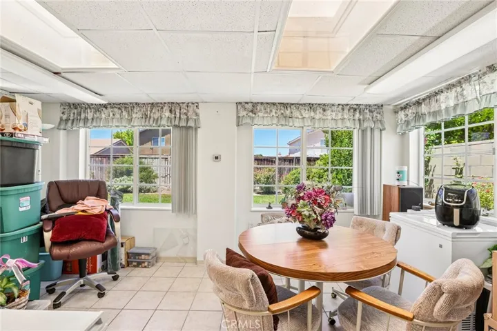 Enclosed Sunroom - Perfect Flex Space for Hobbies, Craftroom, Games while taking in the Backyard Views!
