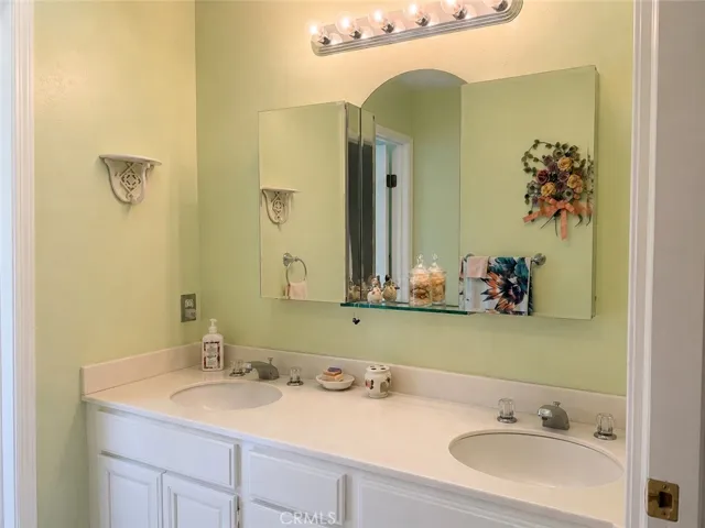 The additional bedrooms share this full bath.  Shower and tub not shown.
