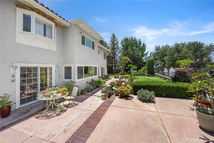 Whether enjoying your morning coffee, hosting family and friends, or simply unwinding at the end of the day, this private backyard provides the perfect setting with generous patio space, mature landscaping, and picturesque surroundings.  Ample room to explore the possibility of an ADU (Accessory Dwelling Unit), subject to city requirements and approvals.