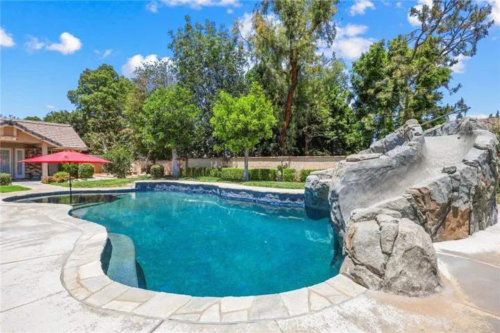 POOL WITH SLIDE AND WATERFALL/CAVE