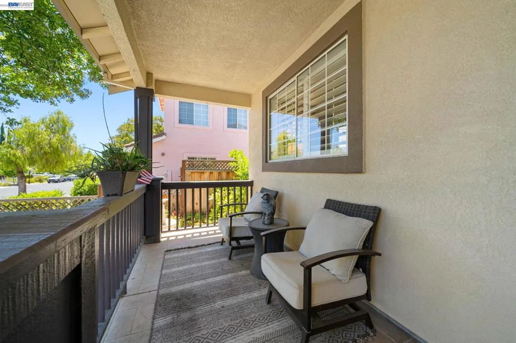 CHARMING FRONT PORCH TO RELAX IN