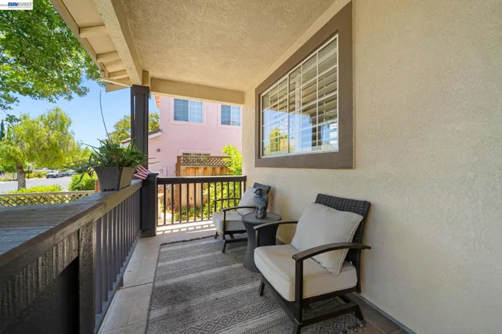 CHARMING FRONT PORCH TO RELAX IN