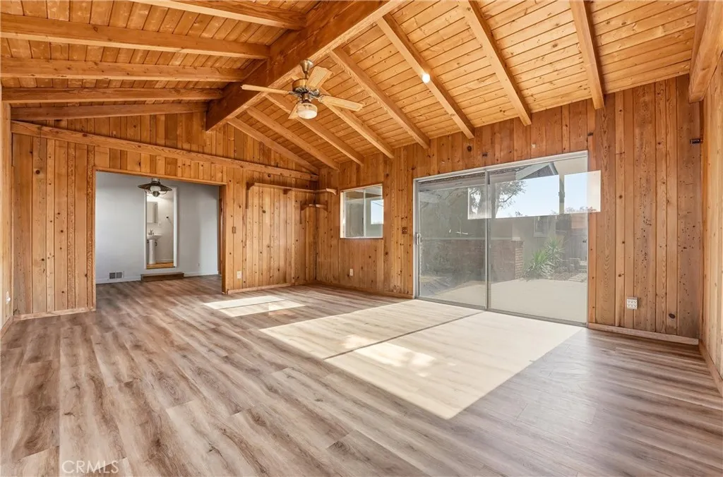 Family Room to Bonus Area View - Family over looks Backyard Patios.