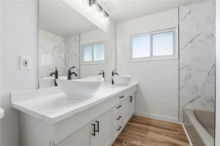 Hall Bath with Dual sinks, newly upgraded.