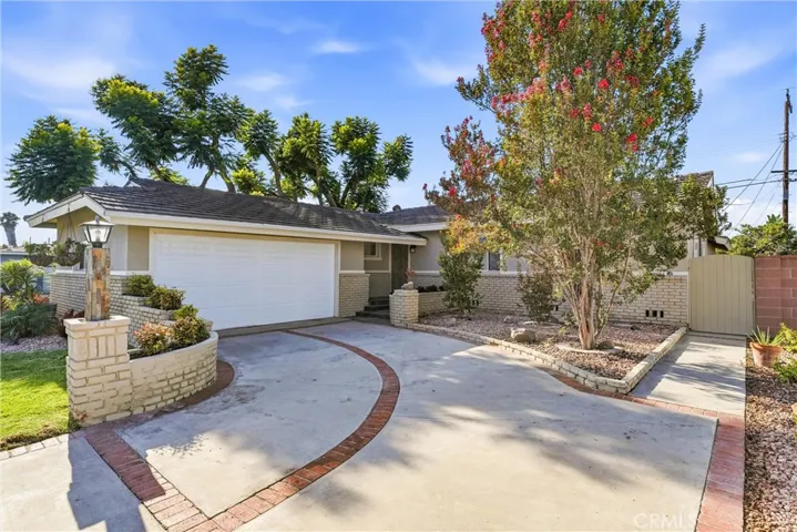 Driveway Trimmed with Brick Work and Hard-Scape