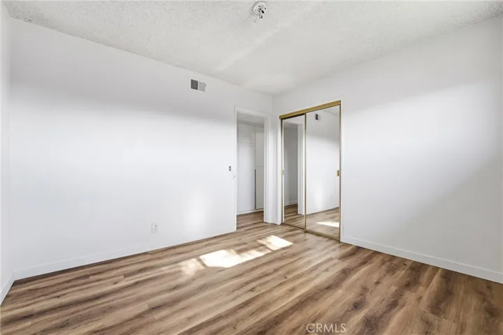 Hall Bedroom 2 has Mirrored Closet Doors too.