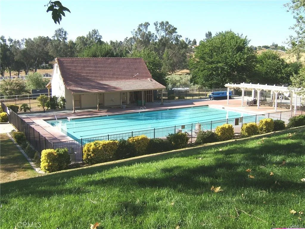 Main Pool With Bathroom And Changing Facility.  Kiddie Pool To The Right