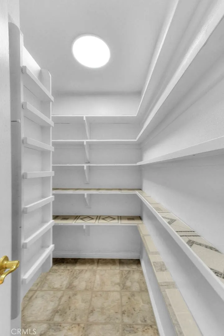 Opposite From Kitchen Is Very Spacious Pantry With Selves Galore.  New Overhead LED Lighting.