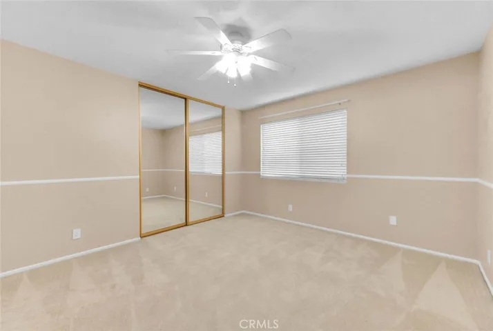 Spacious Bedroom Three With Mirrored Closet Doors