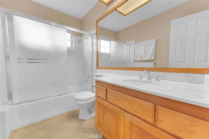 Hallway Bathroom For Bedrooms One And Two.  New Sink Faucet, New Magnetic Held Shower Head And New Bath Fixtures