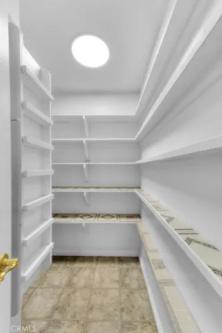 Opposite From Kitchen Is Very Spacious Pantry With Selves Galore.  New Overhead LED Lighting.