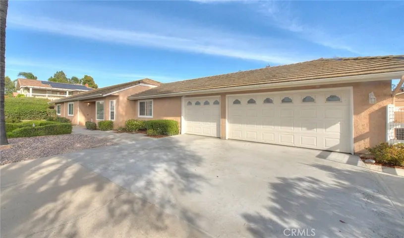 Three Car Garage.  Exterior Has Been Completely Repainted Along With All Wood Trim And Fascia Repaired And Repainted Plus Windows Upgraded To Vinyl Windows!  No Exterior Maintenance For Years To Come!