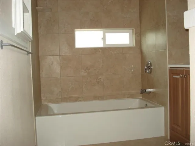 Full bath with tub