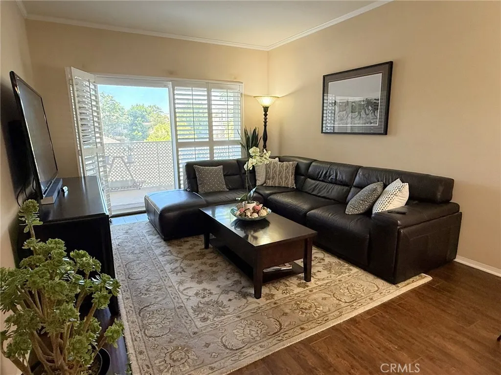 spacious living room with sliding door to patio