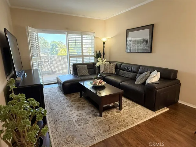 spacious living room with sliding door to patio
