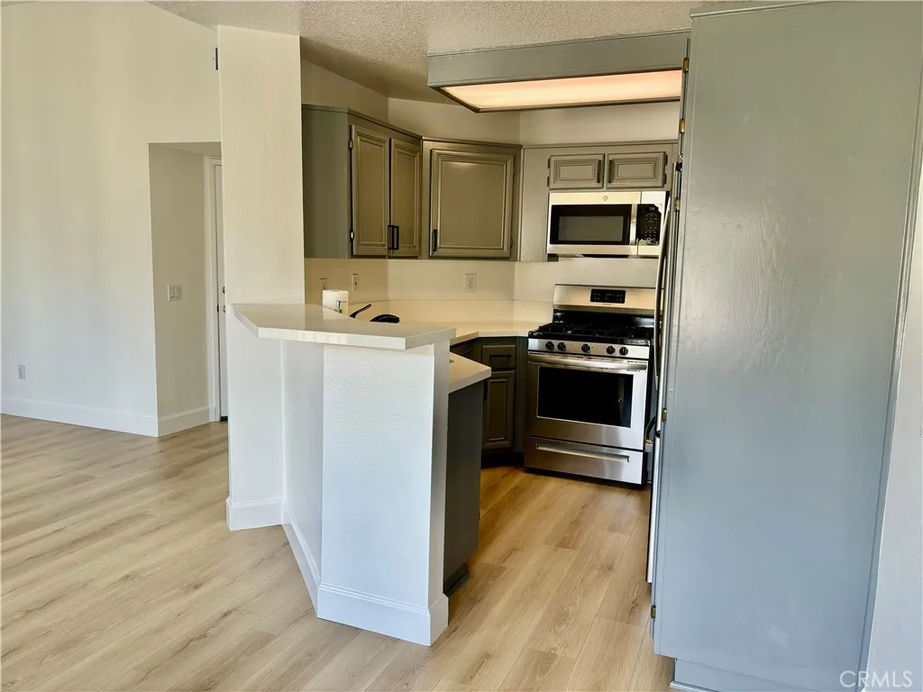 View To Kitchen With Breakfast Bar