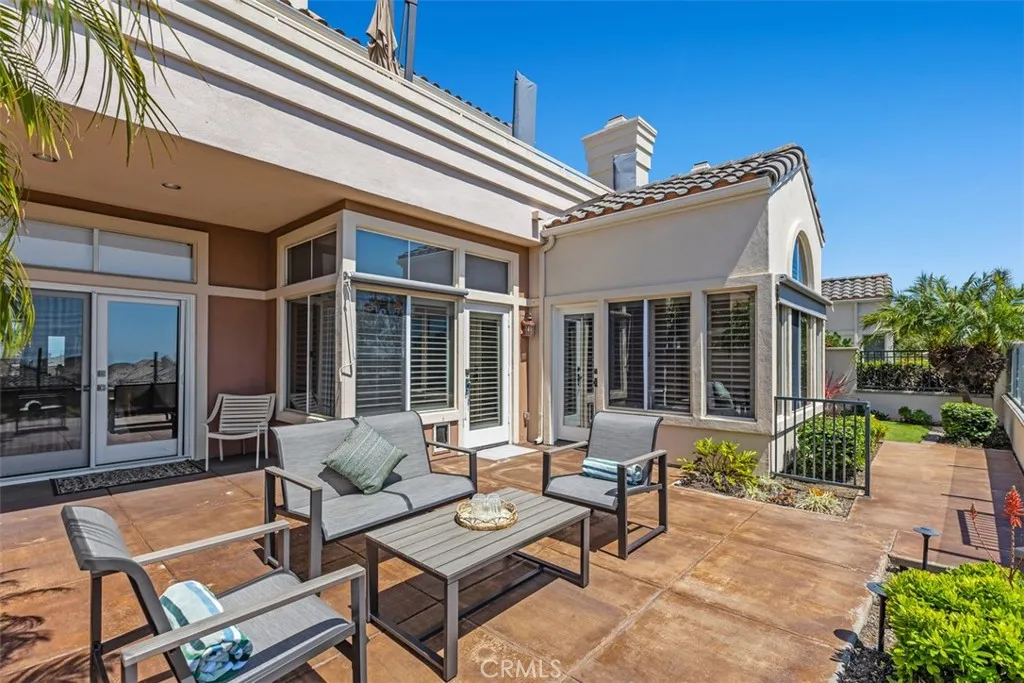 3 doors leading to the patio from the primary bedroom, kitchen and sun room