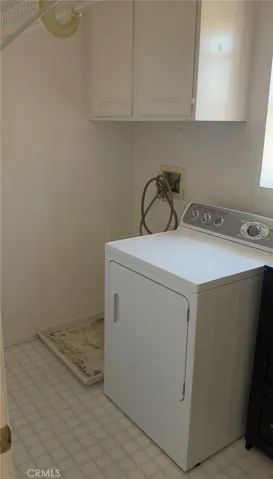 Laundry room with only a dryer