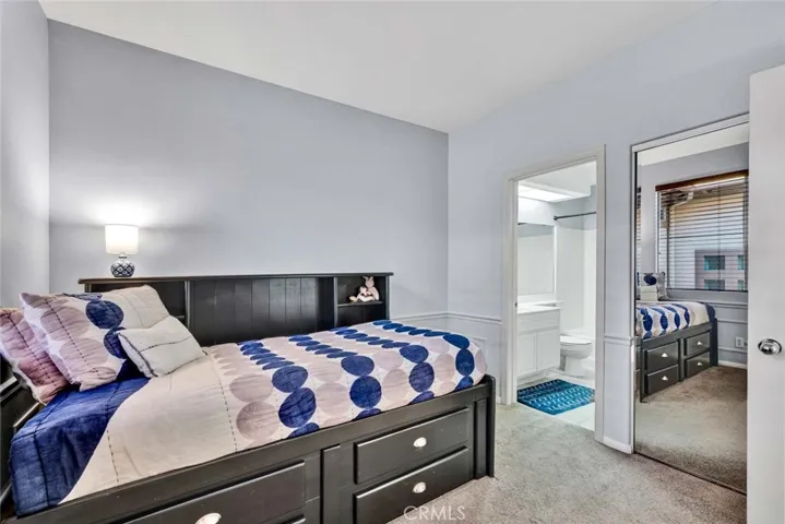 Secondary bedroom, mirrored wardrobe and full ensuite.