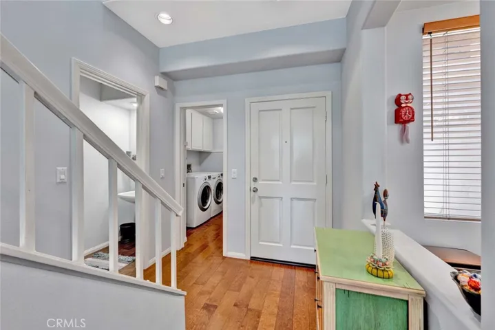 Pass the inside laundry room to get to your direct access 1 car garage. Welcoming entry with guest bath nearby.