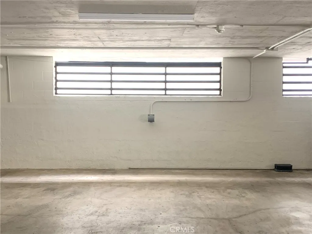 2 side by side parking spaces w EV charging outlet