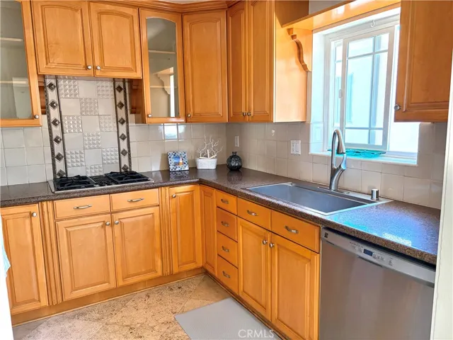 kitchen with stainless fridge, over