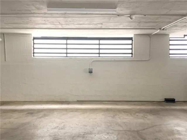 2 side by side parking spaces w EV charging outlet