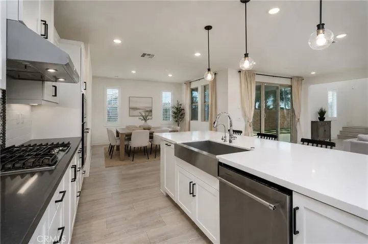Virtually Staged Kitchen View to Dining ARea
