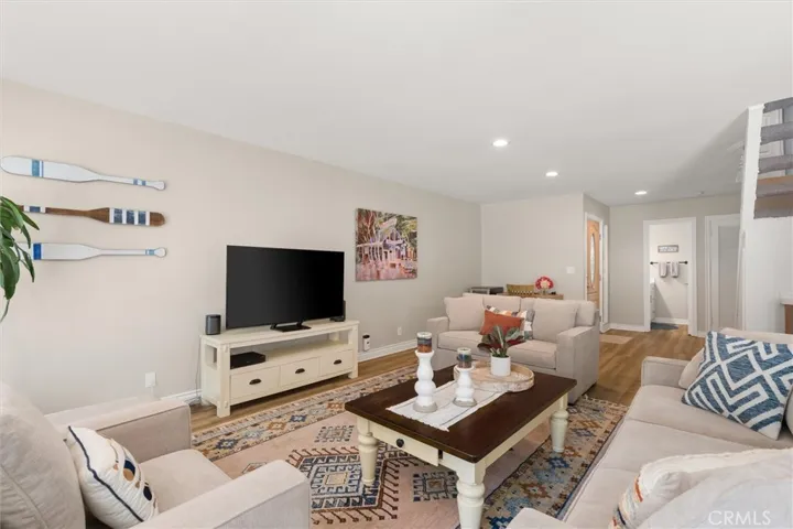 Living room towards entry, downstairs powder