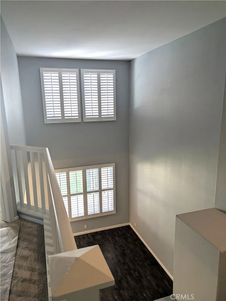 upstairs hall view to living room