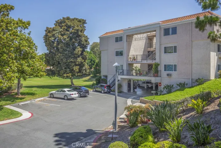 Condo is top right corner, with subterranean parking and elevator and guest parking outside