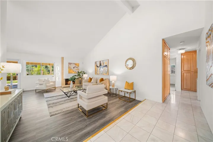 Living room w/cathedral ceilings