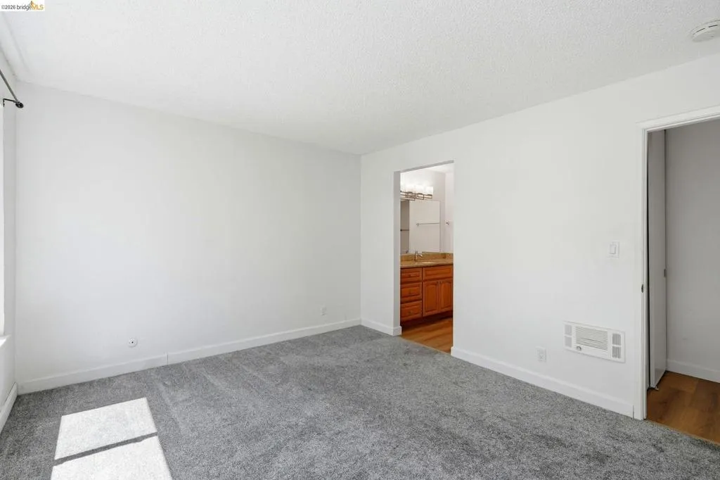 Private bathroom features lots of countertop space and separate room with toilet and shower.
